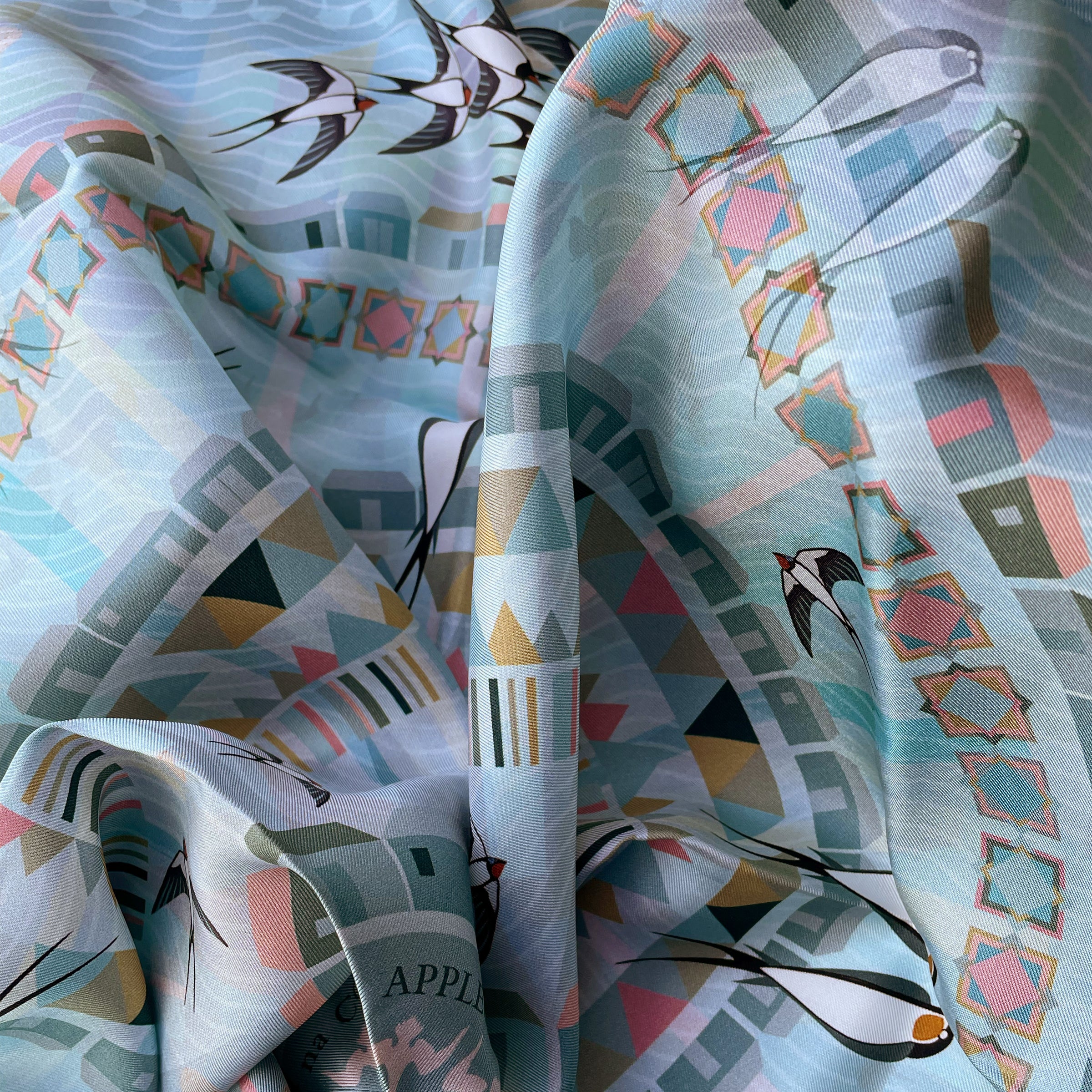Colourful design featuring Swallows from the Applecross Croft design house.